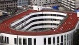 China inaugura pista de atletismo em telhado de escola